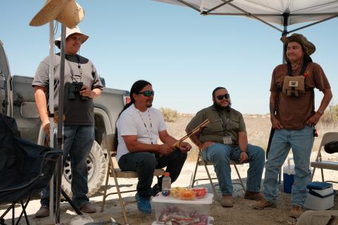 Kenny, Pops, and Cultural Dept staff perform songs.