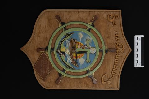 Wooden sign from Pulau Bidong, with scale