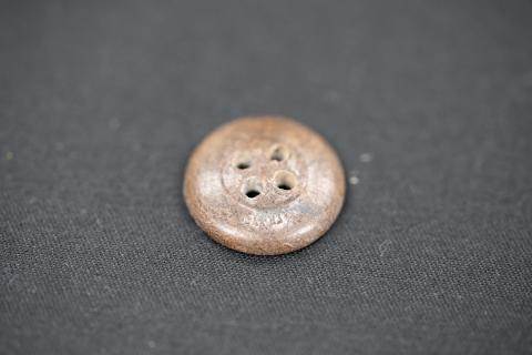 Bottom of button