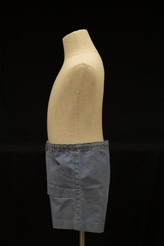Blue children's shorts, left side