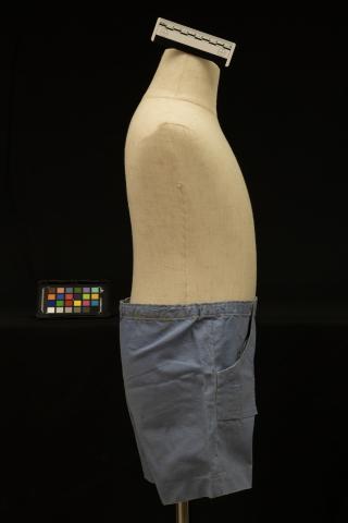 Blue children's shorts, color card and scale