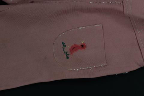 Children's pink pants, close-up of pocket