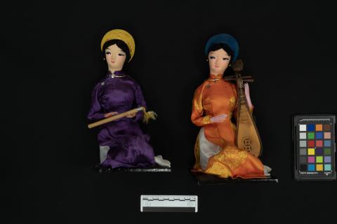 Two dolls (Bac and Nam) together